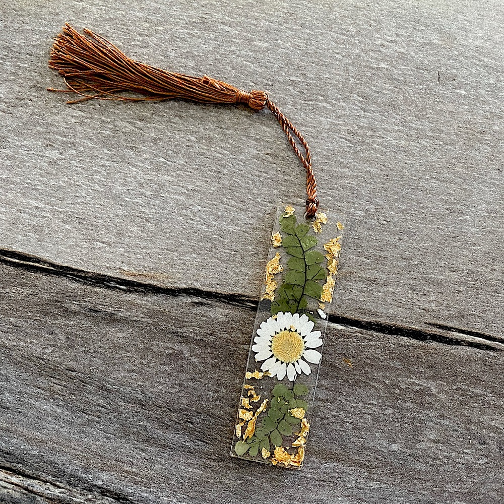 Handmade resin bookmark with dried flowers and gold embellishments
